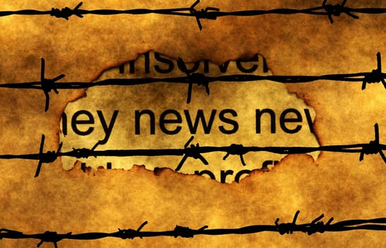 News paper hole againsr barbwire