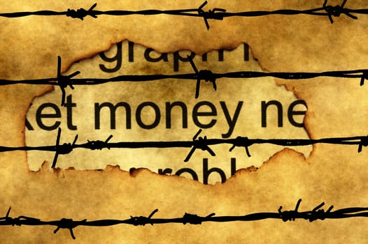 Money paper hole against barbwire