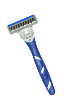 Closeup of blue shaving blade on white surface