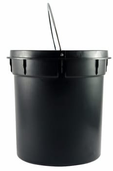 Black trash bucket on white surface