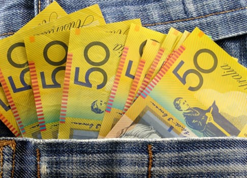 australian money in jeans pocket
