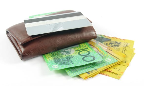 wallet with australian money and credit card over white