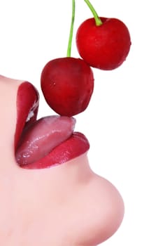 closeup of woman's lips with cherry