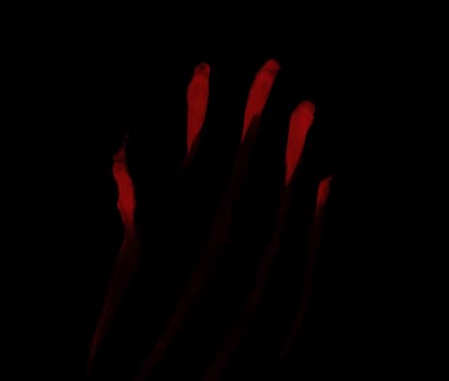 red blood prints on black background