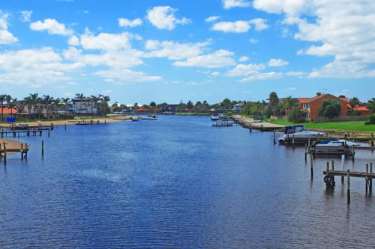 Boats and houses on river