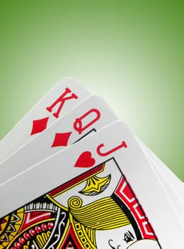 playing cards on green background
