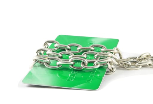 credit card locked in the chain over white