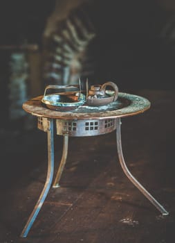 Vintage rusty table with candle holders in vintage style