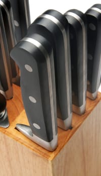 set of kitchen knives in wooden box