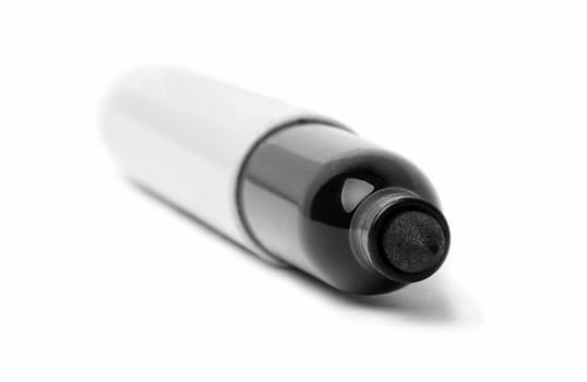 closeup of big black marker on white