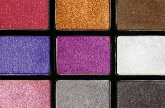 closeup of colorful cosmetics eyeshadows