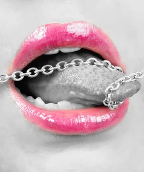 chain on tongue.silence concept. selective color