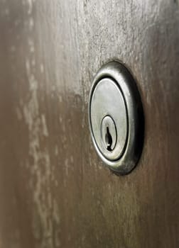 closeup of old rusty keyhole.shallow DOF