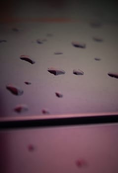 wet car texture closeup with drops.shallow DOF