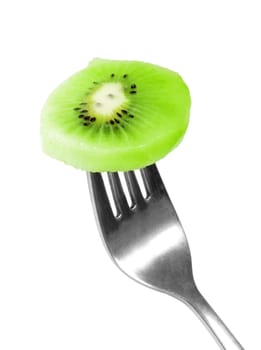 slice of kiwi on old fork
