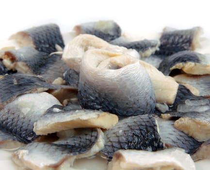 marinanated fish pieces on plate