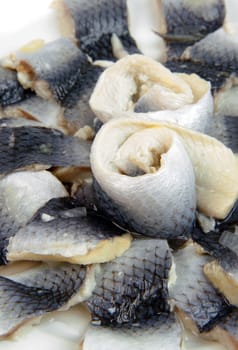 marinanated fish pieces on plate
