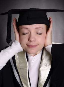 graduated girl with hat closeup