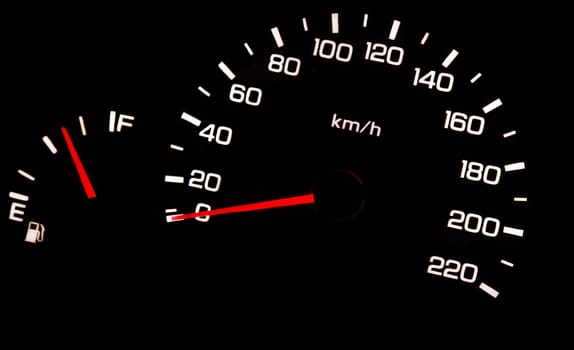 car odometer closeup in the darkness