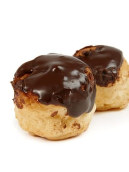 sweet tasty profiteroles with chocoate