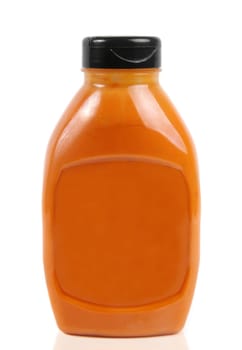 yellow sauce bottle isolated on white