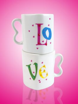 two love mugs in heart shape