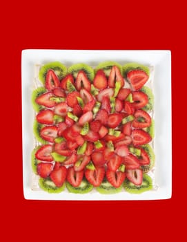 fruit cake closeup with strawberries and kiwi