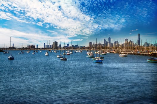 Fishing boats and the view of Melbourne City