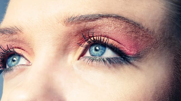 female eye closeup with makeup