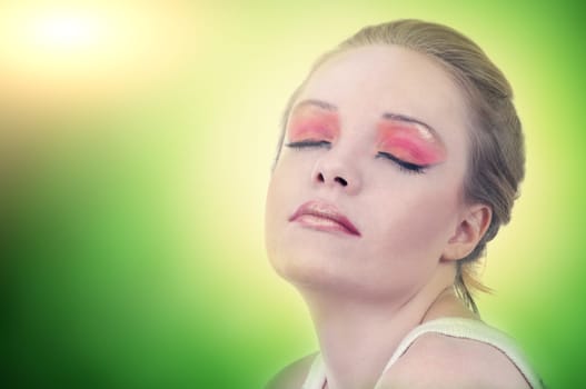 closeup of beautiful fashion woman portrait.bright green background
