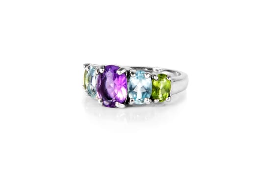closeup of ring with colorful stones