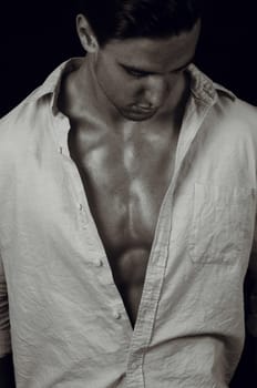 portrait of the elegant man on dark