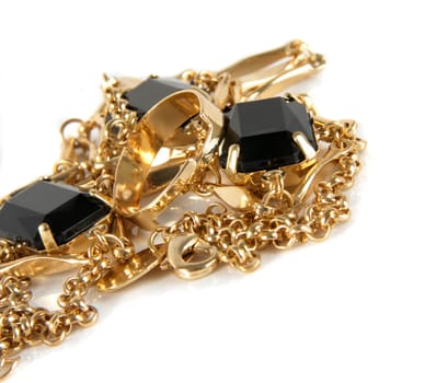 various jewelry closeup over white