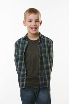 Portrait of a cheerful young man of eleven years on a white background