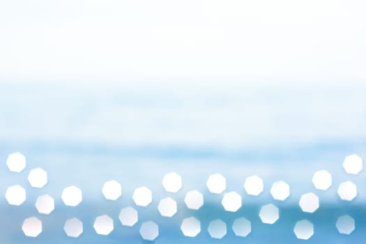 Abstract background - sun glare on a highly blurred surface of the water