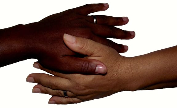 salvador, bahia / brazil - february 13, 2011: hand of black man and hand of white woman are seen together in the city of Salvador..