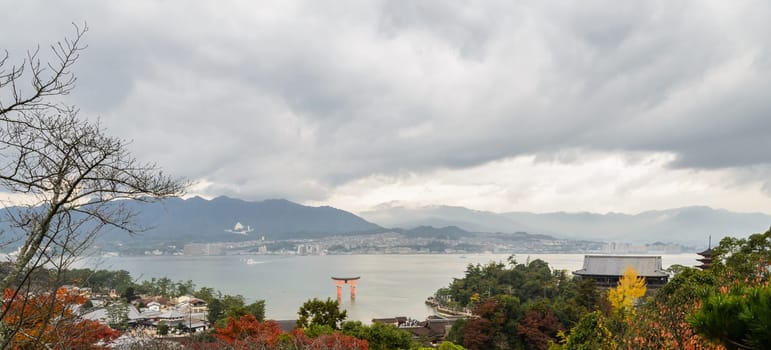 Aerial view of Miyajima island with Torii Gate of Itsukushima shrine. View from Mount Misen in Miyajima, Japan