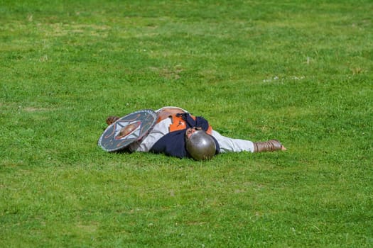 Alba Iulia, Romania - May 04, 2019: Defeated Dacian Warrior on the Festival Roman Apulum "Revolta"""