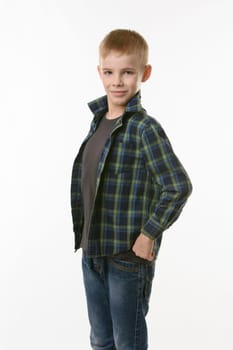 Portrait of a ten year old boy sticking his chest forward