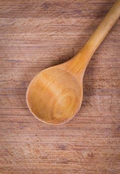 wooden spoon ovet textured wooden table