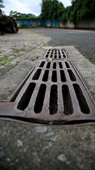 salvador, bahia / brazil - june 27, 2020: manhole grating for rainwater drainage is seen in a condominium in the city of Salvador.