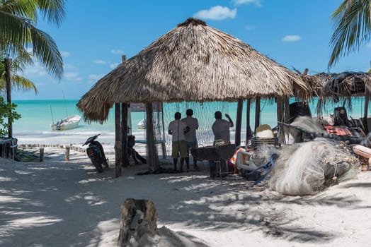 fishermen on the mexican caribbean island holbox hanging up their nets