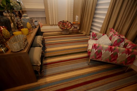 salvador, bahia / brazil - january 18, 2017: room decorated with carpet, sofa and armchair in a deco store in the city of Salvador.