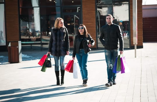 Happy friends making shopping