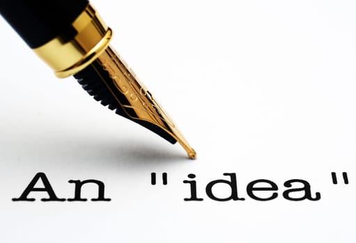 Fountain pen on idea text