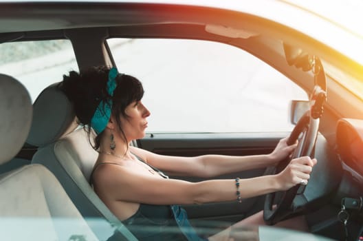 Pretty woman driving the car