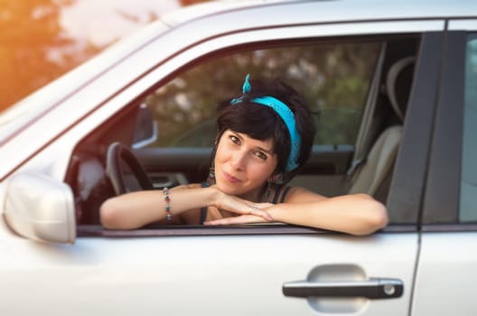Pretty woman driving the car
