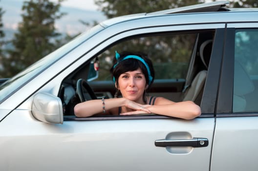 Pretty woman driving the car