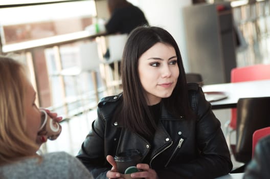 Girls sitting in the cafe