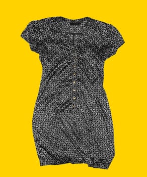 Female casual dress on yellow background